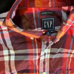 Men’s button down plaid shirt.